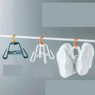 China Behind Doors/On Walls Fashion Creative Simple Home Balcony Hot Selling Small Plastic Air Drying Windproof Shoe Rack for sale