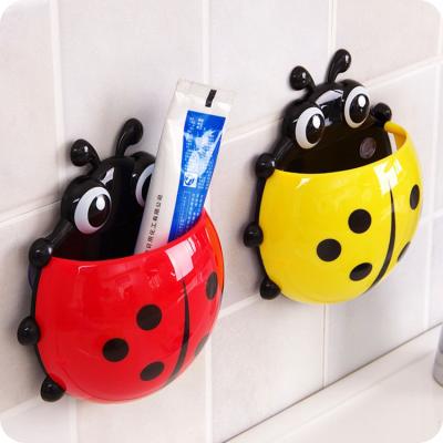 China Durable popular creative daily household necessities cute cartoon seven star ladybug suction cup toothbrush cup for sale