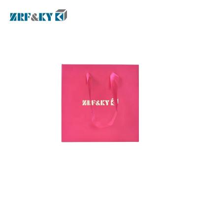 China Custom Handmade Wholesale Luxury Rose Paper Shopping Bag With Gold Foil Stamped Logo for sale