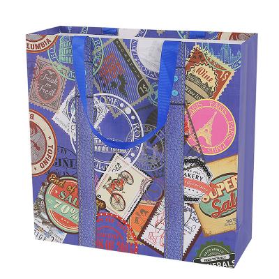 China Custom Luxury Recycled Materials Wrapping Paper Shopping Paper Wine Bag With Your Own Logo Grosgrain Ribbon Handle Washable Paper Packaging Suitcase for sale