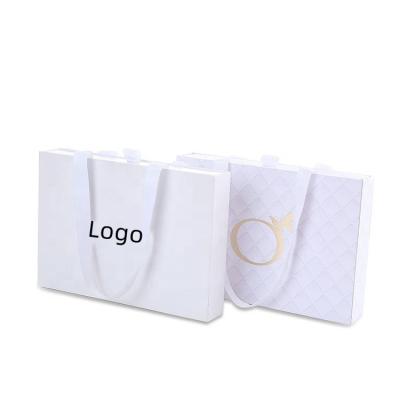 China Materials Factory Free Sample Recycled Special Gold Color Craft Paper Gift Paper Packaging Bag With Own Logo for sale