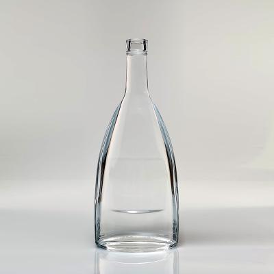 China Unusual Transparent Beverage Unique Shape Alcohol Glass Bottle Vodka Bottles For Sale for sale