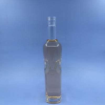 China Wholesale 300ml Beverage Vodka Glass Bottle 300ml Empty Transparent Elegant Whiskey Vodka Vodka Juniper Bottle For Sale for sale