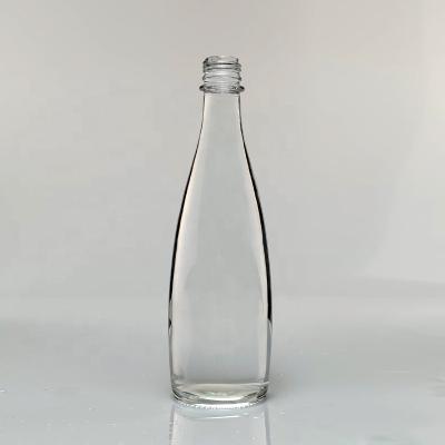 China Wholesale Beverage Droplet Shaped Tequila Bottles Brandy Glass Bottles Rum Gin Glass Elegant Bottles for sale