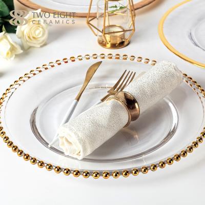 China Sustainable High Quality Full Size Hotel Restaurant Dinner Under Plate Round Gold Beaded Glass Chargers Plate For Wedding for sale