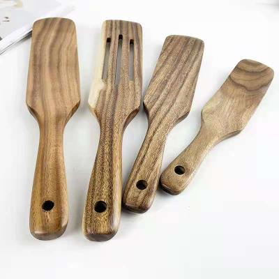 China Sustainable Eco Friendly Kitchen Perforated Acacia Wooden Hanging Spatula Set Baking Thicken Spoon Kitchenware for sale