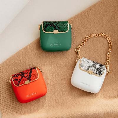 China Hotel New Arrivals Mini Bag Portable Hand Warmers Power Bank Handbag Rechargeable OEM Logo Customization for sale