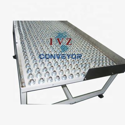 China Heavy Duty IVZ Oil Ball Transfer Unit Table Connection With Belt Conveyor Machine for sale