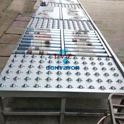 China Heavy Duty Oil Trackball Work Table Ball Bearing Worktable With Conveyor for sale