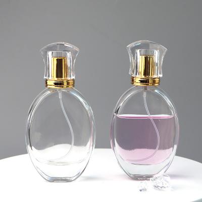 China Sustainable / Eco-friendly / Stocked Customize Wholesale Luxury Unique Oval Perfume Packaging 50ml Empty Perfume Glass Bottles Glass Perfume Spray Bottle for sale