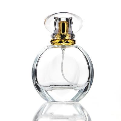 China Sustainable / Eco-friendly / Stocked China Manufacturer Flat Round Shape Spray Perfume Bottle 50ml Luxury Glass Woman Perfume Bottle Clear Glass With Label for sale