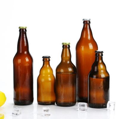 China Sustainable/Eco-friendly/Stocked Amber Glass Beer Bottles Green 330ml 500ml 650ml 1000ml Empty Beer Wine Beverage Glass Bottle With Swing Top And Metal Crown Cap for sale