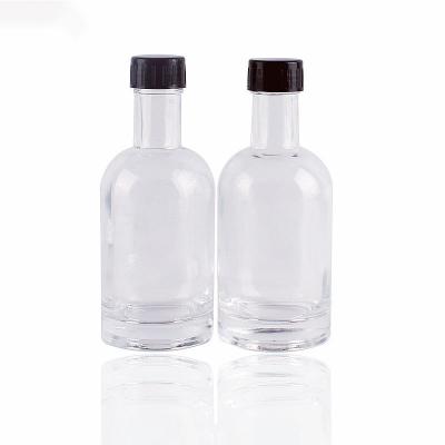 China Customized Sustainable/Eco-Friendly/Stocked Logo Wine Bottle Ice Water Liquor Glass Whiskey Bottles Glass Spirits Bottle Clear Empty 220ml With Screw Top for sale