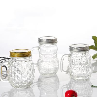 China Creative Wide Mouth Viable/Eco-Friendly/Stocked 120ml Mini Cute Glass Mason Jar For Milk Pudding Storage Yourgut Jelly Jam Honey FoodJars Glass With Handle for sale