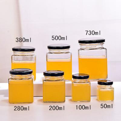 China SquareSealed Wide Mouth Clear Empty Glass Heatable Pickle Jar Food Grade Glass Jar For Honey Jam Sauce Chili Bottle With Black Metal Lid for sale