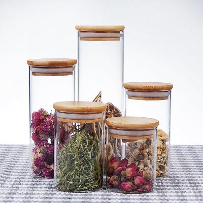 China Sustainable Wholesale Food Grade High Borosilicate Round Clear Glass Storage Bottle Jar & Glass Spice Container Jar With Bamboo Lid for sale