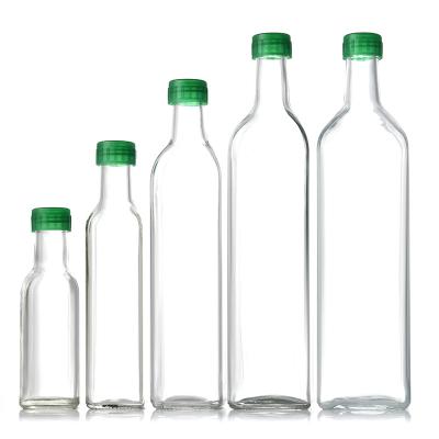 China Viable/Eco-friendly/Stocked 100ml 250ml Empty Transparent Round Glass Olive Oil Bottle/Amber Green Olive Oil Glass Bottle With Shrink Cap Or Screw Cap for sale