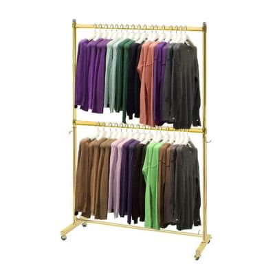 China Easy Installation 2 Rails Metal Gold Clothing Rack For Shop Display for sale