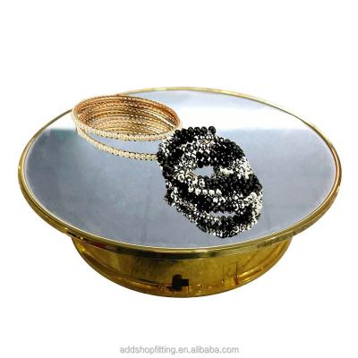 China Durable Electric Gold Rotating Racks Jewelry Display for sale