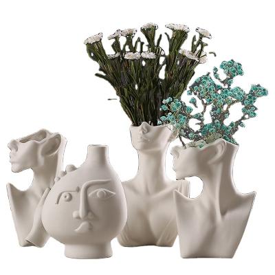 China Nordic Ceramic Flower For Indoor Art Decoration Face Vase Handwork Ceramic Simple Living Room Vases Ware Body Style Body for sale