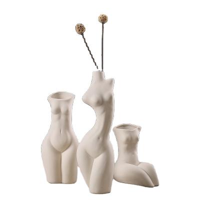 China Modern Single Vase White Art Tabletop Ceramic Home Decor Modern Creative Nordic Design Flower Vases Body for sale