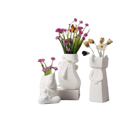 China Ceramic Flower Pot Ceramic Vases Ware Vase In Sculpture Ceramic White Face Home Decor for sale