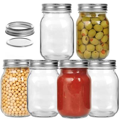 China Wholesale Stored 16oz Round Empty Mason Glass Bottle Holders Storage Food Jar Custom Glass Mason Jar With Lid for sale