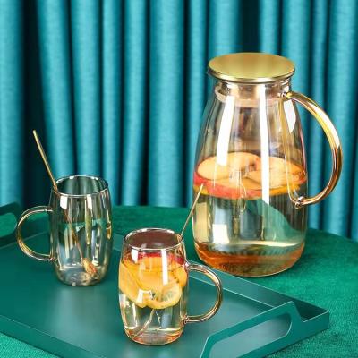 China Hot Selling Heavy Duty Transparent Heat Resistant Teapots Stocked With Lid Bamboo Round Glass Teapot With Handle for sale