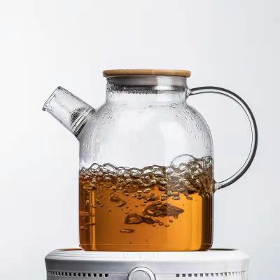 China 1000ml Big Spout Teapot Water Stored Clear Glass Kettle With Bamboo Lid for sale