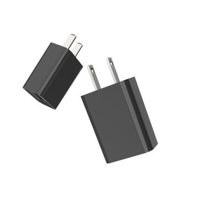 China UniversalÂ   100~240V 50/60Hz 2 Metal Pin DC 5V1A FCC USB-A Port ABS Material Power Supply Portable Black White Travel Charger for sale