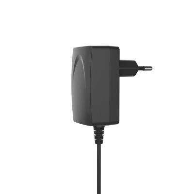 China UniversalÂ   12V2A 12W Household Appliance Power Charging Power Adapter Portable Digital Device in Black Color for sale