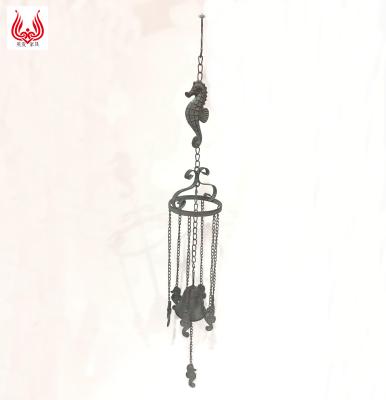 China Retro Europe Style Cast Iron Seahorse Design Wind Chime Garden Decoration With Wrought Iron Bell Hanging Craft for sale