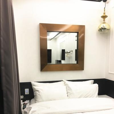 China Art Decor Customized Design PVD Coating Brushed Gold Stainless Steel Metal Mirror Frame For Hotel for sale