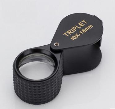 China Folding Cover 10x18mm Optical Glass Lens Magnifier With Rubber And Metal Body for sale