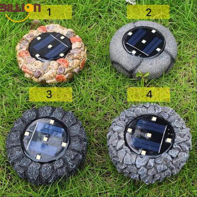 China Outdoor Resin Buried Lamp Stone Solar Garden Light Waterproof Unique Design for sale