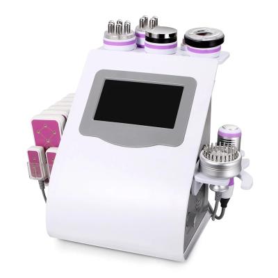 China Face Lift New 9 in 1 Multifunction Ultrasonic Beauty Machine Microcurent Vacuum RF Slimming Beauty Facial Machine for sale