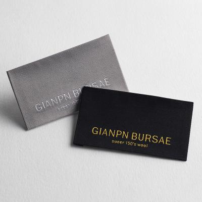 China Sustainable Garment Accessories Brand Private Custom Logo Design Woven Flag Label Fabric Label For Apparel for sale