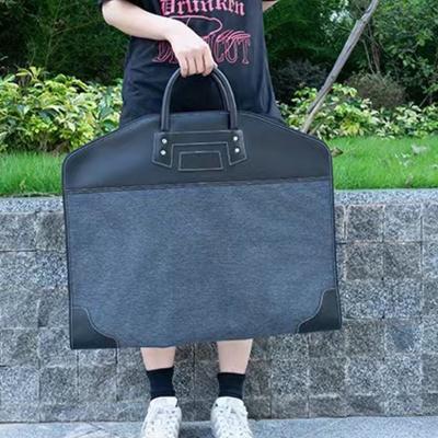 China Storage Custom Logo Printing Fashionable Nice Branded New Luxury Nonwoven Garment Bag Overnight Suit Bag for sale