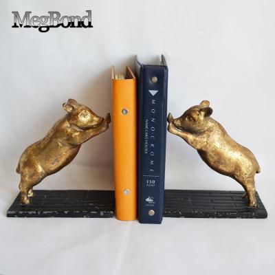 China Metal Cast Iron Golden Hog ​​Bookends For Holding Books for sale