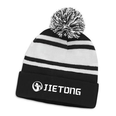 China COMMON Wholesale Customize Your Own Logo Fashion Warm Unisex Woven Pom Pom Winter Knit Hat for sale