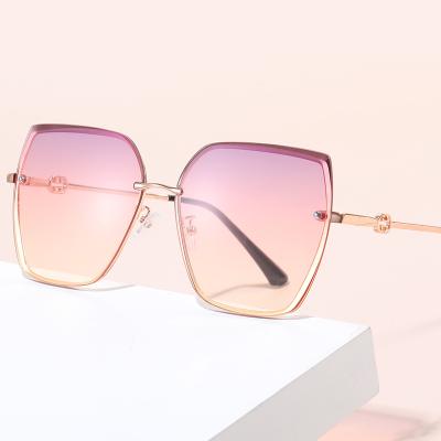 China UV400 / Polarized 2022 New Trend Ins Color Changing Polygonal Sunglasses Trend Street Rimless Photo Ladies Sunglasses Essential Decorative Lenses for sale