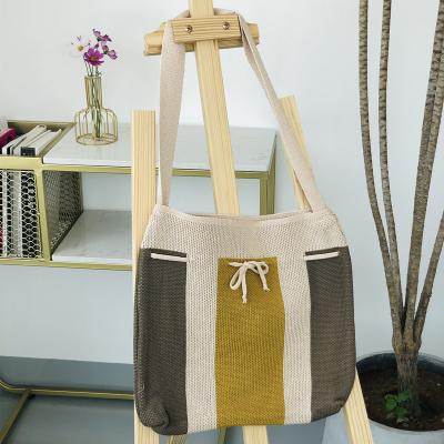 China New lightweight Korean version of the fire super student knitting Tote Bag portable wool shoulder single women's fabric bag for sale