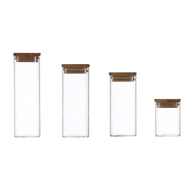 China Freshness Preservation 250ml-1300ml Kitchen Storage Box Container With Wooden Lid Multifunctional Dry Food All Size Airtight Storage Glass Canister for sale