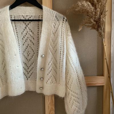 China Breathable mohair cardigan with silk white color hollow out jacquard shorts cardigan sweater with natural pearl buttons for sale