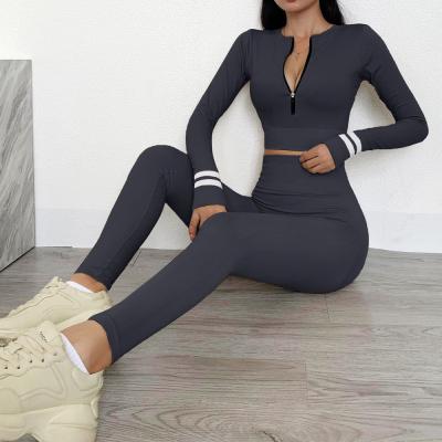 China Breathable Woman Gym Fitness Clothes Seamless Stripe Zipper Long Sleeve Leggings Yoga Wear Set for sale