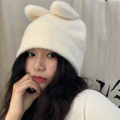 China breathable & Waterproof Pure Color Girl Cute Soft Rabbit Ears Knitted Hat Wool Women Winter Acrylic Furry Hat for sale