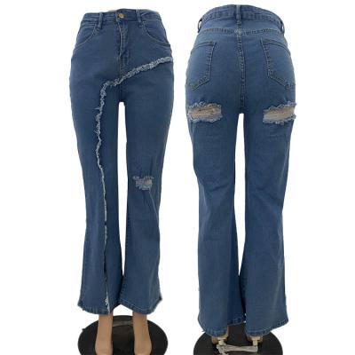 China Viable Stylish Ladies Split To Hem Jeans Bell Bottoms Irregular Sexy Women Ripped Flare Jeans Pants for sale