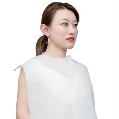 China Factory Eco-friendly Disposable Nonwoven Restaurant Cosmetic Clean Cheap Apron For Beauty for sale