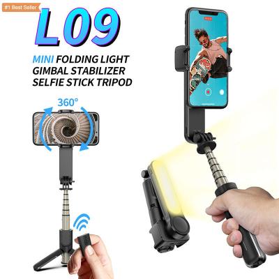 China Anti Blurred Shooting L09 Selfie Stick Gimbal Stabilizer Smart Live Stand Tripod 360 Rotation Handheld Anti-Shake Selfie Led Light Wireless Selfie L09 for sale