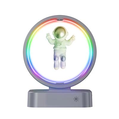 China Wireless Charger For Mobile Phone Maglev Astronaut Portable Speaker Wireless Speaker With 15W RGB Wireless Charging Alarm Clock Led Speaker Wireless Charger for sale